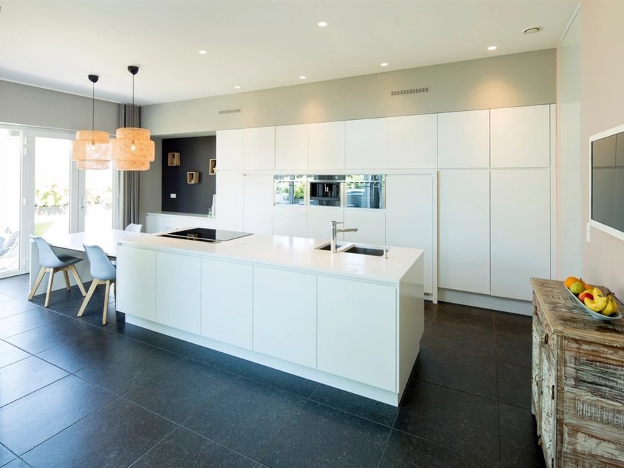 Sample photo: bright white kitchen with a long island